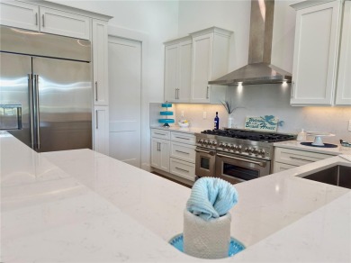 Welcome to 279 Yacht Harbor Drive, a custom-built single-family on Hammock Dunes Club in Florida - for sale on GolfHomes.com, golf home, golf lot