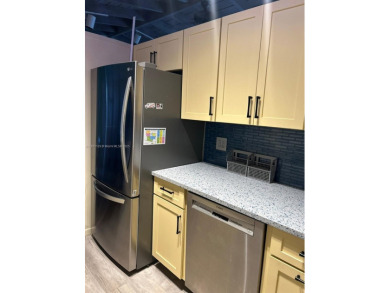 Kitchen, bathroom, floors & ceilings have been tastefully on Fort Lauderdale Country Club in Florida - for sale on GolfHomes.com, golf home, golf lot