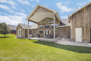 This stunning custom-built home sits on a generous lot right on on Star Valley RV Golf Course in Wyoming - for sale on GolfHomes.com, golf home, golf lot