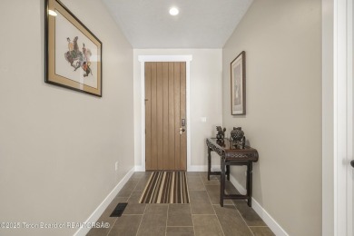 This stunning custom-built home sits on a generous lot right on on Star Valley RV Golf Course in Wyoming - for sale on GolfHomes.com, golf home, golf lot