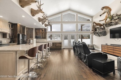 This stunning custom-built home sits on a generous lot right on on Star Valley RV Golf Course in Wyoming - for sale on GolfHomes.com, golf home, golf lot