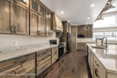 This stunning custom-built home sits on a generous lot right on on Star Valley RV Golf Course in Wyoming - for sale on GolfHomes.com, golf home, golf lot