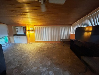 Kitchen, bathroom, floors & ceilings have been tastefully on Fort Lauderdale Country Club in Florida - for sale on GolfHomes.com, golf home, golf lot