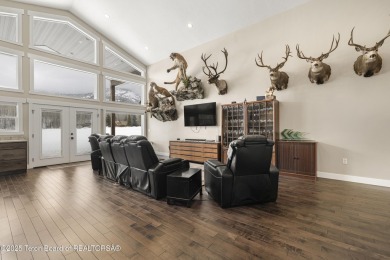 This stunning custom-built home sits on a generous lot right on on Star Valley RV Golf Course in Wyoming - for sale on GolfHomes.com, golf home, golf lot