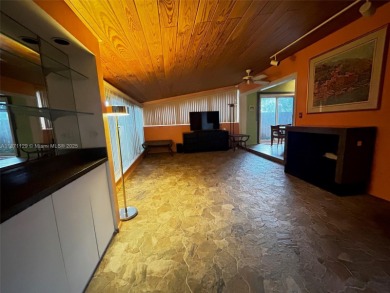 Kitchen, bathroom, floors & ceilings have been tastefully on Fort Lauderdale Country Club in Florida - for sale on GolfHomes.com, golf home, golf lot