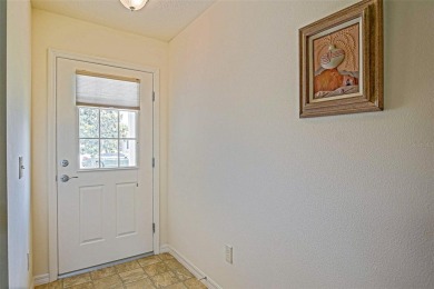 Looking for The Villages lifestyle in a 2-bedroom 2 bath plus on The Links of Spruce Creek in Florida - for sale on GolfHomes.com, golf home, golf lot