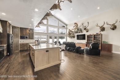 This stunning custom-built home sits on a generous lot right on on Star Valley RV Golf Course in Wyoming - for sale on GolfHomes.com, golf home, golf lot
