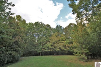 Nice wooded lot - almost an acre- with seasonal view of Lake on Boots Randolph Golf Course in Kentucky - for sale on GolfHomes.com, golf home, golf lot