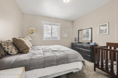 This stunning custom-built home sits on a generous lot right on on Star Valley RV Golf Course in Wyoming - for sale on GolfHomes.com, golf home, golf lot