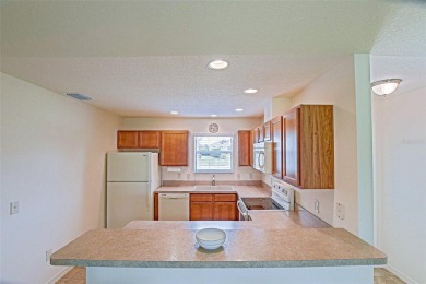 Looking for The Villages lifestyle in a 2-bedroom 2 bath plus on The Links of Spruce Creek in Florida - for sale on GolfHomes.com, golf home, golf lot