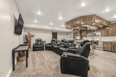 This stunning custom-built home sits on a generous lot right on on Star Valley RV Golf Course in Wyoming - for sale on GolfHomes.com, golf home, golf lot