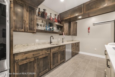 This stunning custom-built home sits on a generous lot right on on Star Valley RV Golf Course in Wyoming - for sale on GolfHomes.com, golf home, golf lot