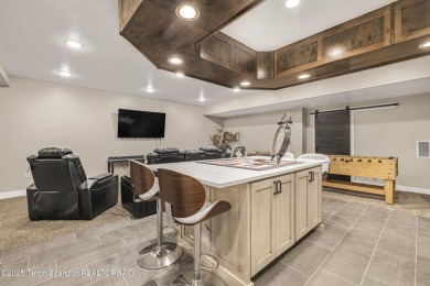 This stunning custom-built home sits on a generous lot right on on Star Valley RV Golf Course in Wyoming - for sale on GolfHomes.com, golf home, golf lot