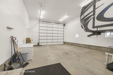 This stunning custom-built home sits on a generous lot right on on Star Valley RV Golf Course in Wyoming - for sale on GolfHomes.com, golf home, golf lot