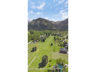 This stunning custom-built home sits on a generous lot right on on Star Valley RV Golf Course in Wyoming - for sale on GolfHomes.com, golf home, golf lot