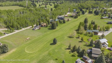 This stunning custom-built home sits on a generous lot right on on Star Valley RV Golf Course in Wyoming - for sale on GolfHomes.com, golf home, golf lot