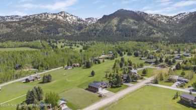 This stunning custom-built home sits on a generous lot right on on Star Valley RV Golf Course in Wyoming - for sale on GolfHomes.com, golf home, golf lot