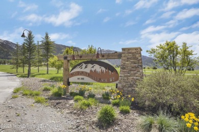 This stunning custom-built home sits on a generous lot right on on Star Valley RV Golf Course in Wyoming - for sale on GolfHomes.com, golf home, golf lot