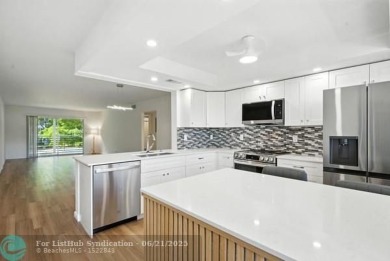 GORGEOUS! COMPLETELY REMODELED 2BEDROOM/2BATH Florida Room on Wynmoor Golf Course in Florida - for sale on GolfHomes.com, golf home, golf lot