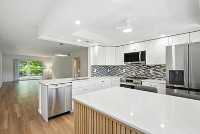 GORGEOUS! COMPLETELY REMODELED 2BEDROOM/2BATH Florida Room on Wynmoor Golf Course in Florida - for sale on GolfHomes.com, golf home, golf lot