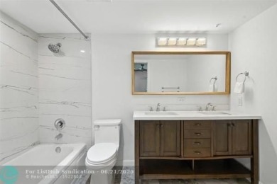 GORGEOUS! COMPLETELY REMODELED 2BEDROOM/2BATH Florida Room on Wynmoor Golf Course in Florida - for sale on GolfHomes.com, golf home, golf lot