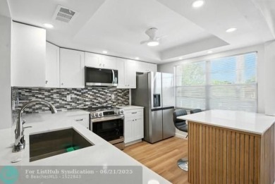 GORGEOUS! COMPLETELY REMODELED 2BEDROOM/2BATH Florida Room on Wynmoor Golf Course in Florida - for sale on GolfHomes.com, golf home, golf lot