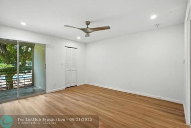 GORGEOUS! COMPLETELY REMODELED 2BEDROOM/2BATH Florida Room on Wynmoor Golf Course in Florida - for sale on GolfHomes.com, golf home, golf lot