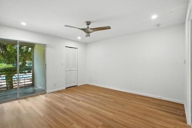 GORGEOUS! COMPLETELY REMODELED 2BEDROOM/2BATH Florida Room on Wynmoor Golf Course in Florida - for sale on GolfHomes.com, golf home, golf lot