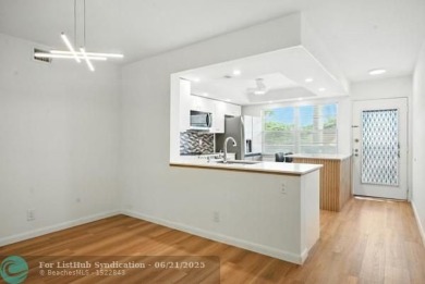 GORGEOUS! COMPLETELY REMODELED 2BEDROOM/2BATH Florida Room on Wynmoor Golf Course in Florida - for sale on GolfHomes.com, golf home, golf lot