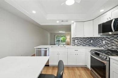 GORGEOUS! COMPLETELY REMODELED 2BEDROOM/2BATH Florida Room on Wynmoor Golf Course in Florida - for sale on GolfHomes.com, golf home, golf lot