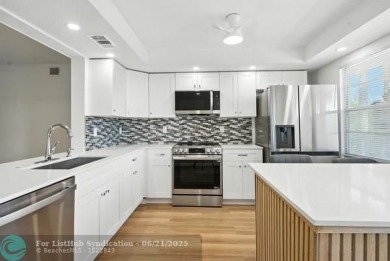 GORGEOUS! COMPLETELY REMODELED 2BEDROOM/2BATH Florida Room on Wynmoor Golf Course in Florida - for sale on GolfHomes.com, golf home, golf lot