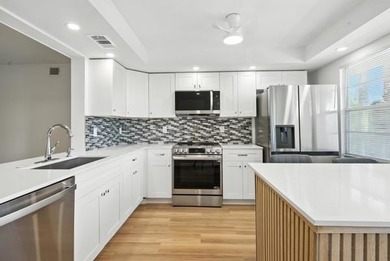 GORGEOUS! COMPLETELY REMODELED 2BEDROOM/2BATH Florida Room on Wynmoor Golf Course in Florida - for sale on GolfHomes.com, golf home, golf lot