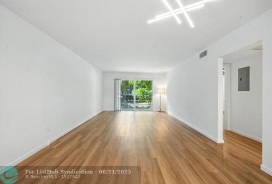 GORGEOUS! COMPLETELY REMODELED 2BEDROOM/2BATH Florida Room on Wynmoor Golf Course in Florida - for sale on GolfHomes.com, golf home, golf lot