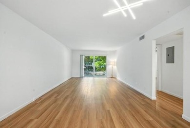 GORGEOUS! COMPLETELY REMODELED 2BEDROOM/2BATH Florida Room on Wynmoor Golf Course in Florida - for sale on GolfHomes.com, golf home, golf lot