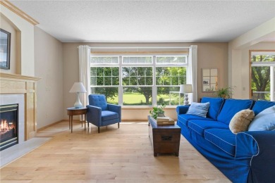 Stunning 5-bed, 4-bath home with a 3-car garage in Blaine's on TPC of the Twin Cities in Minnesota - for sale on GolfHomes.com, golf home, golf lot