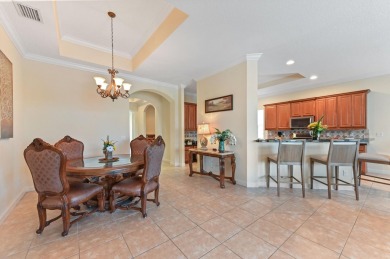 Presenting an impressive RIVIERA Model residence in the renowned on PGA Golf Club in PGA Village in Florida - for sale on GolfHomes.com, golf home, golf lot
