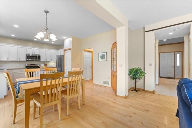 Stunning 5-bed, 4-bath home with a 3-car garage in Blaine's on TPC of the Twin Cities in Minnesota - for sale on GolfHomes.com, golf home, golf lot