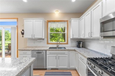 Stunning 5-bed, 4-bath home with a 3-car garage in Blaine's on TPC of the Twin Cities in Minnesota - for sale on GolfHomes.com, golf home, golf lot