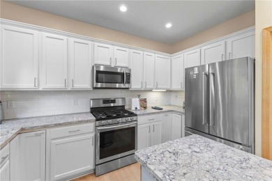 Stunning 5-bed, 4-bath home with a 3-car garage in Blaine's on TPC of the Twin Cities in Minnesota - for sale on GolfHomes.com, golf home, golf lot