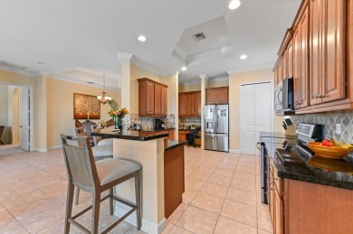 Presenting an impressive RIVIERA Model residence in the renowned on PGA Golf Club in PGA Village in Florida - for sale on GolfHomes.com, golf home, golf lot