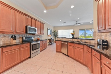 Presenting an impressive RIVIERA Model residence in the renowned on PGA Golf Club in PGA Village in Florida - for sale on GolfHomes.com, golf home, golf lot
