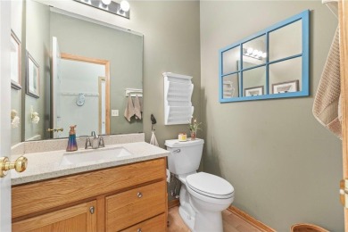 Stunning 5-bed, 4-bath home with a 3-car garage in Blaine's on TPC of the Twin Cities in Minnesota - for sale on GolfHomes.com, golf home, golf lot