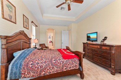 Presenting an impressive RIVIERA Model residence in the renowned on PGA Golf Club in PGA Village in Florida - for sale on GolfHomes.com, golf home, golf lot