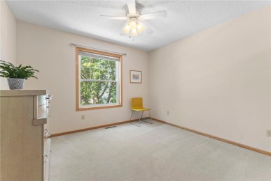 Stunning 5-bed, 4-bath home with a 3-car garage in Blaine's on TPC of the Twin Cities in Minnesota - for sale on GolfHomes.com, golf home, golf lot