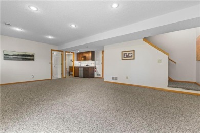 Stunning 5-bed, 4-bath home with a 3-car garage in Blaine's on TPC of the Twin Cities in Minnesota - for sale on GolfHomes.com, golf home, golf lot