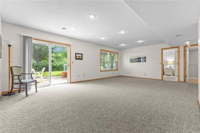 Stunning 5-bed, 4-bath home with a 3-car garage in Blaine's on TPC of the Twin Cities in Minnesota - for sale on GolfHomes.com, golf home, golf lot