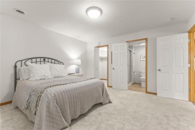 Stunning 5-bed, 4-bath home with a 3-car garage in Blaine's on TPC of the Twin Cities in Minnesota - for sale on GolfHomes.com, golf home, golf lot