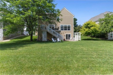 Stunning 5-bed, 4-bath home with a 3-car garage in Blaine's on TPC of the Twin Cities in Minnesota - for sale on GolfHomes.com, golf home, golf lot