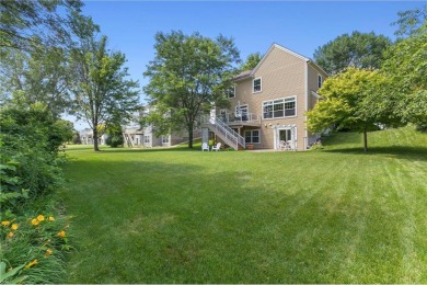 Stunning 5-bed, 4-bath home with a 3-car garage in Blaine's on TPC of the Twin Cities in Minnesota - for sale on GolfHomes.com, golf home, golf lot