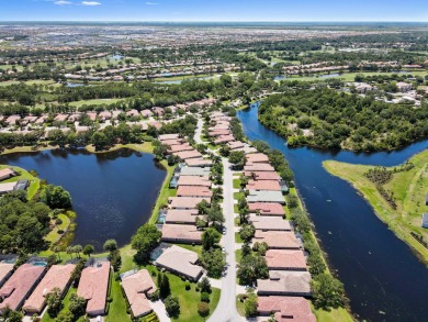 Presenting an impressive RIVIERA Model residence in the renowned on PGA Golf Club in PGA Village in Florida - for sale on GolfHomes.com, golf home, golf lot